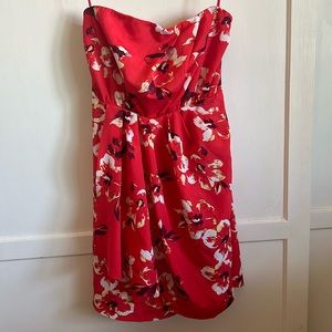 Enjoy the summer with this Express Floral Dress. It can be dressed up or down.
